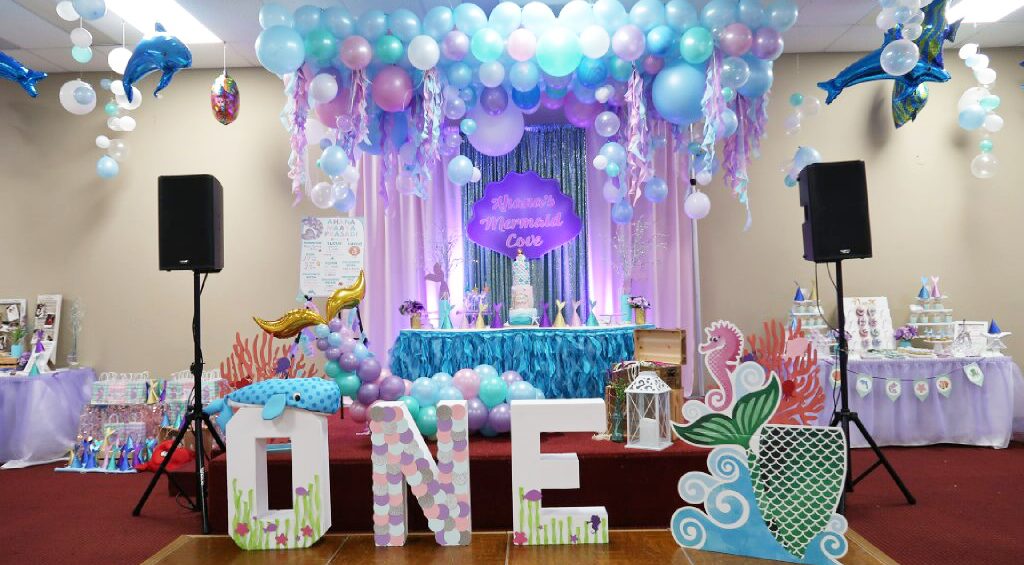 A birthday party with balloons and decorations