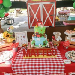 A table with a cake and other food on it