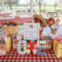 A table with some paper bags and letters