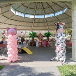 A couple of cows made out of balloons