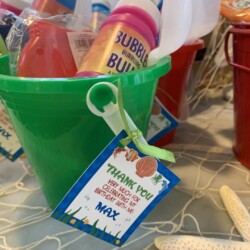 A green bucket with some drinks in it