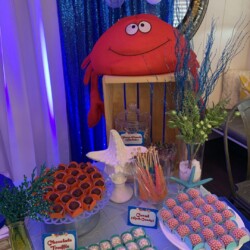 A table with lots of food and decorations