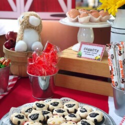 A table with some food and teddy bears on it