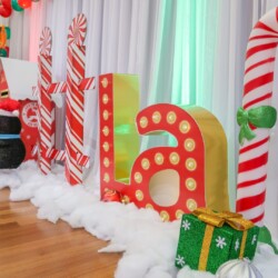 A room with many large letters and presents