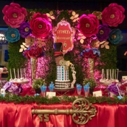 A table with flowers and a key on it