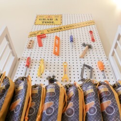 A bunch of tools hanging on the wall