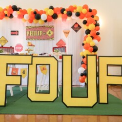 A birthday party with balloons and decorations
