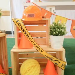 A construction themed birthday party with cones and caution tape.