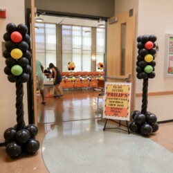 A couple of traffic lights made out of balloons