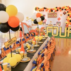 A table with many plates and cups on it