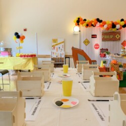 A room with many tables and chairs in it