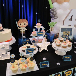 A table with several different types of desserts.