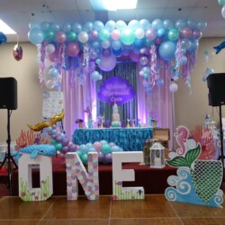 A birthday party with balloons and decorations