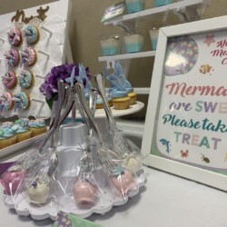 A table with several different types of treats on it.