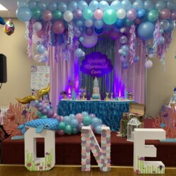 A birthday party with balloons and decorations