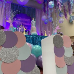 A room with balloons and decorations in it