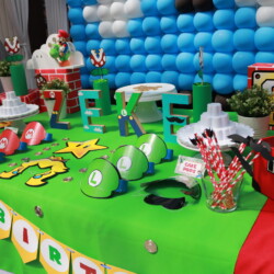 A table with balloons and decorations on it