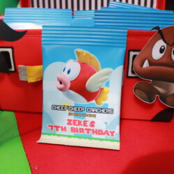 A close up of a bag with a mario party game