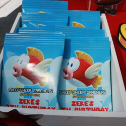 A box of birthday cards with an image of a bird.