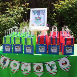 A table with several bags of candy on it