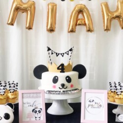 A panda themed birthday party with lots of decorations.