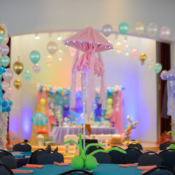 A room with balloons and decorations in it