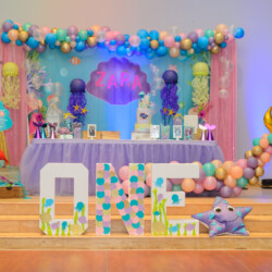 A birthday party with balloons and decorations