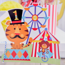 A close up of a birthday card with a tiger and monkey