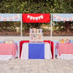 A table with flags and a stand for an event.