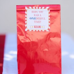 A red bag with a thank you note on it.