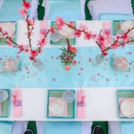 A table set with plates and cups on it